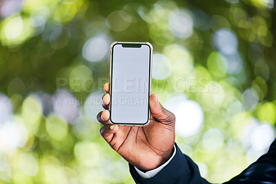Buy stock photo Mockup phone for business man in nature, advertising website and marketing social media post online with smartphone. Closeup of employee or worker hand holding cellphone, showing professional app