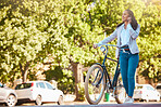 Bike, phone and walking with a young woman talking, exploring and sightseeing the city while enjoying travel and tourism. Carbon footprint, going green and eco friendly lifestyle with a happy female