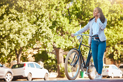 Buy stock photo Bike, phone and walking with a young woman talking, exploring and sightseeing the city while enjoying travel and tourism. Carbon footprint, going green and eco friendly lifestyle with a happy female