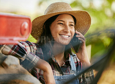 Buy stock photo Agriculture, sustainability and farmer talking on phone call on a break while working on a farm. Happy sustainable farmland worker or agro woman having mobile conversation in the countryside