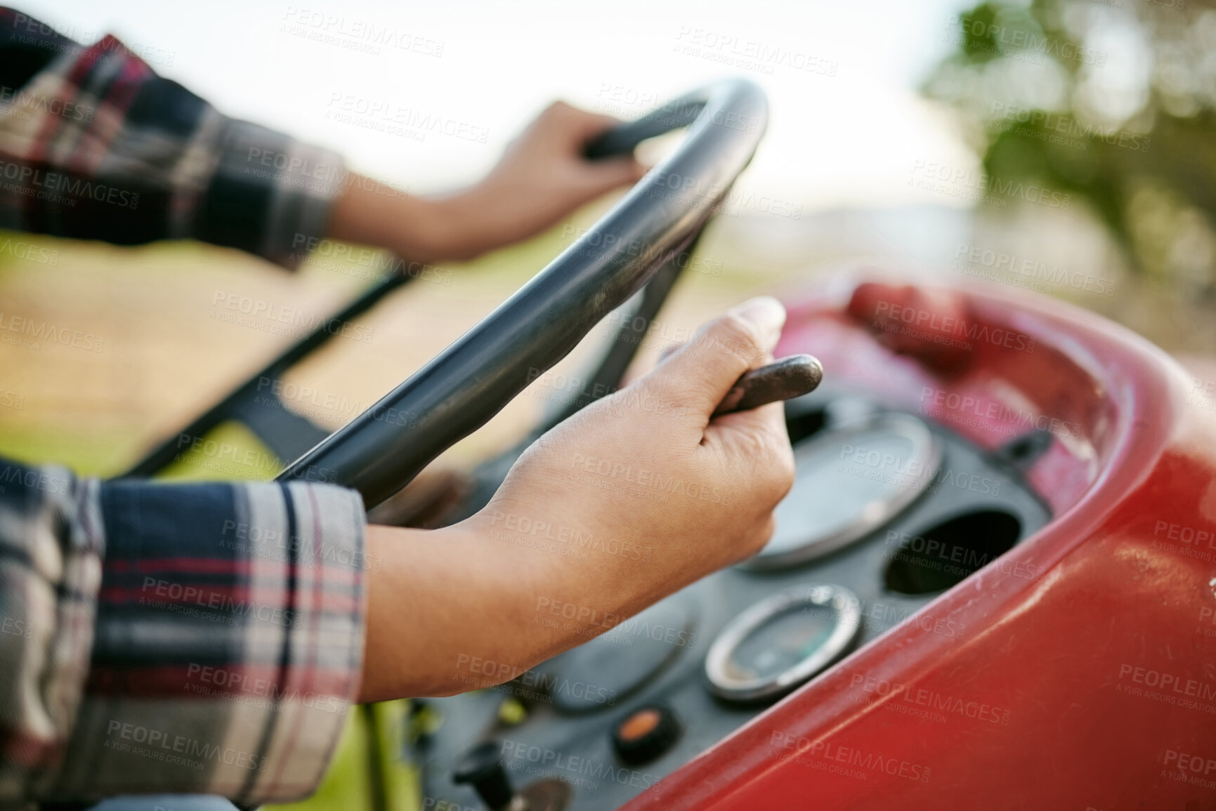 Buy stock photo Farm, tractor and agriculture with hands of a farmer driving a vehicle on a farm for sustainability, growth and development in a sustainable and green environment. Farming crops in the harvest season