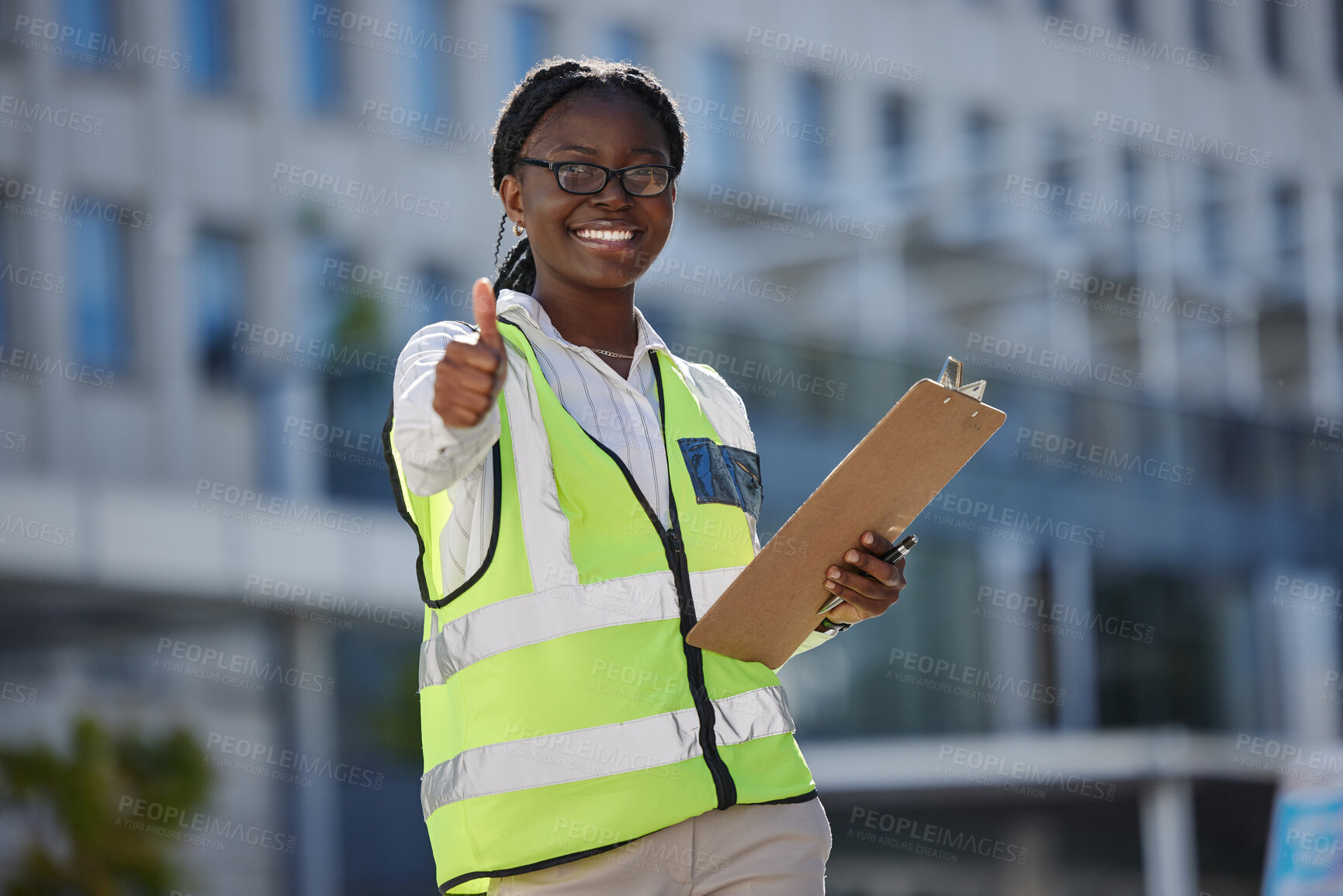 Buy stock photo Thumbs up, success and motivation by health and safety construction worker thank you for support of goal or vision. Happy black woman holding building inspection list, showing winning, trust sign