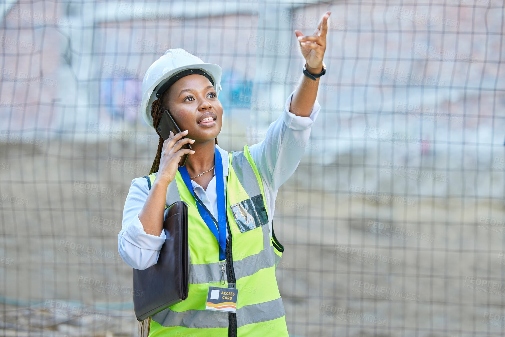Buy stock photo Engineer, construction worker or maintenance and development woman on a phone call while working. Building management employee or manager planning and consulting real estate building project outdoors