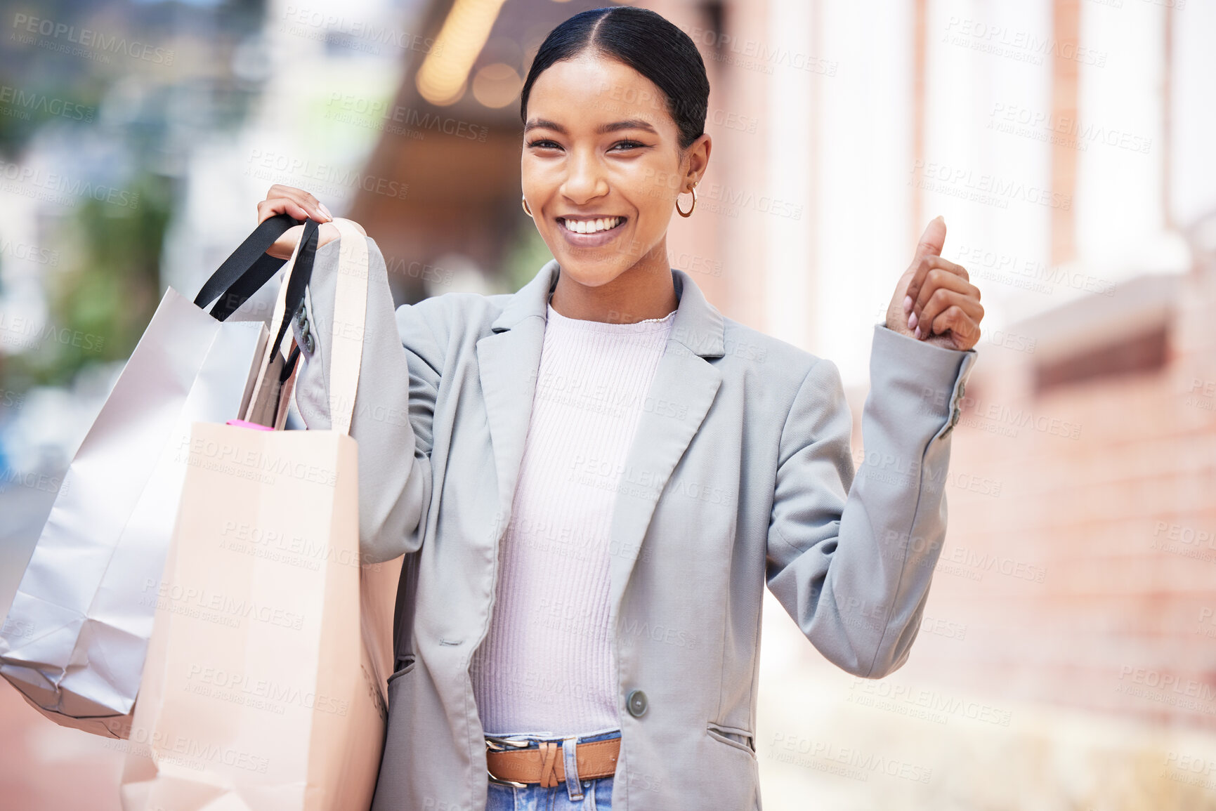 Buy stock photo Shopping, retail and celebration of a young woman in the city, cheering, spending money and looking for a sale in the city. Enjoying a day at the shop, store or mall against an urban background