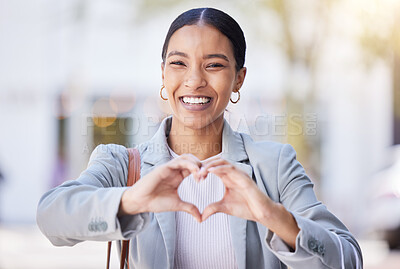Buy stock photo Love, heart and happy hand sign of a young female with a smile with a positive mindset and vision. Portrait of a modern business woman smiling with a hands gesture showing support, trust and care