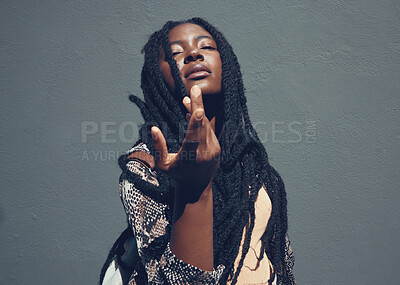 Buy stock photo Beauty, culture and heritage with a black woman in studio against a gray background. Portrait of a beautiful african american female with braided hair posing and feeling confident with attitude