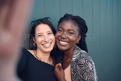 Buy stock photo Friends, smile and happy selfie for social media for fashion, street style or trendy clothes women on blue background. Portrait of fun, playing or comic bonding college students for female diversity