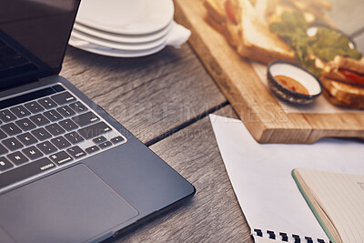 Buy stock photo Restaurant, cafe or coffee shop table as a workspace with a laptop, papers and food in the morning. Background or closeup of a remote and wooden work desk outdoors at a fast food place