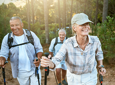 Buy stock photo Hiking retired, elderly and senior friends or tourists in forest or mountains for fitness, health and wellness at old age. Diverse group of active mature pensioners outdoors on weekend hike in nature