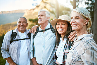 Buy stock photo Hiking, adventure and exploring with a group of senior friends and retired adults enjoying a hike or walk outdoors in nature. Enjoying the view while on a journey of discovery in the forest or woods