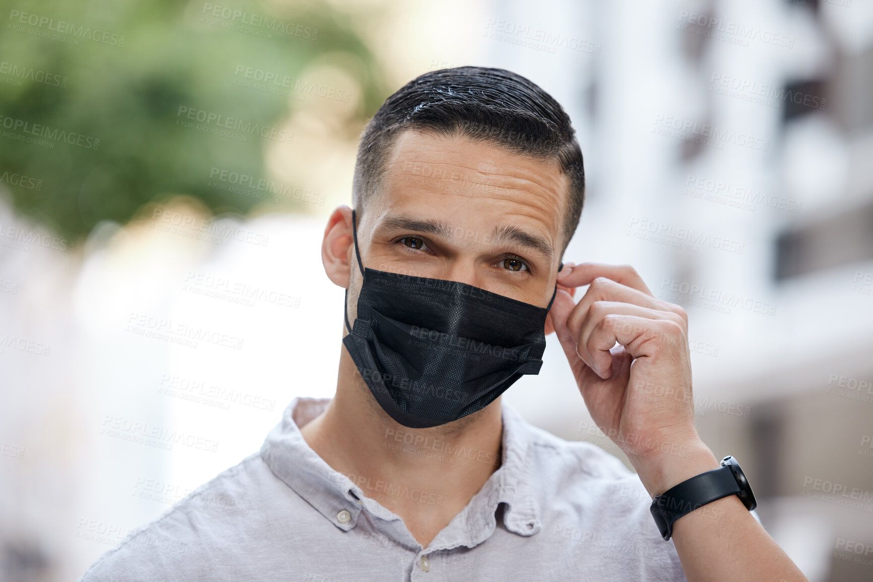 Buy stock photo Freedom, end of covid and man removing face mask after corona virus with bokeh urban city. Trust and compliance in post covid 19 portrait or headshot of young person free after getting vaccine