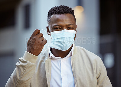 Buy stock photo Happy end of covid, with businessman removing face mask in urban city with vision, goal for success after covid 19. Smile, trust and leadership portrait of corporate worker post covid or corona virus