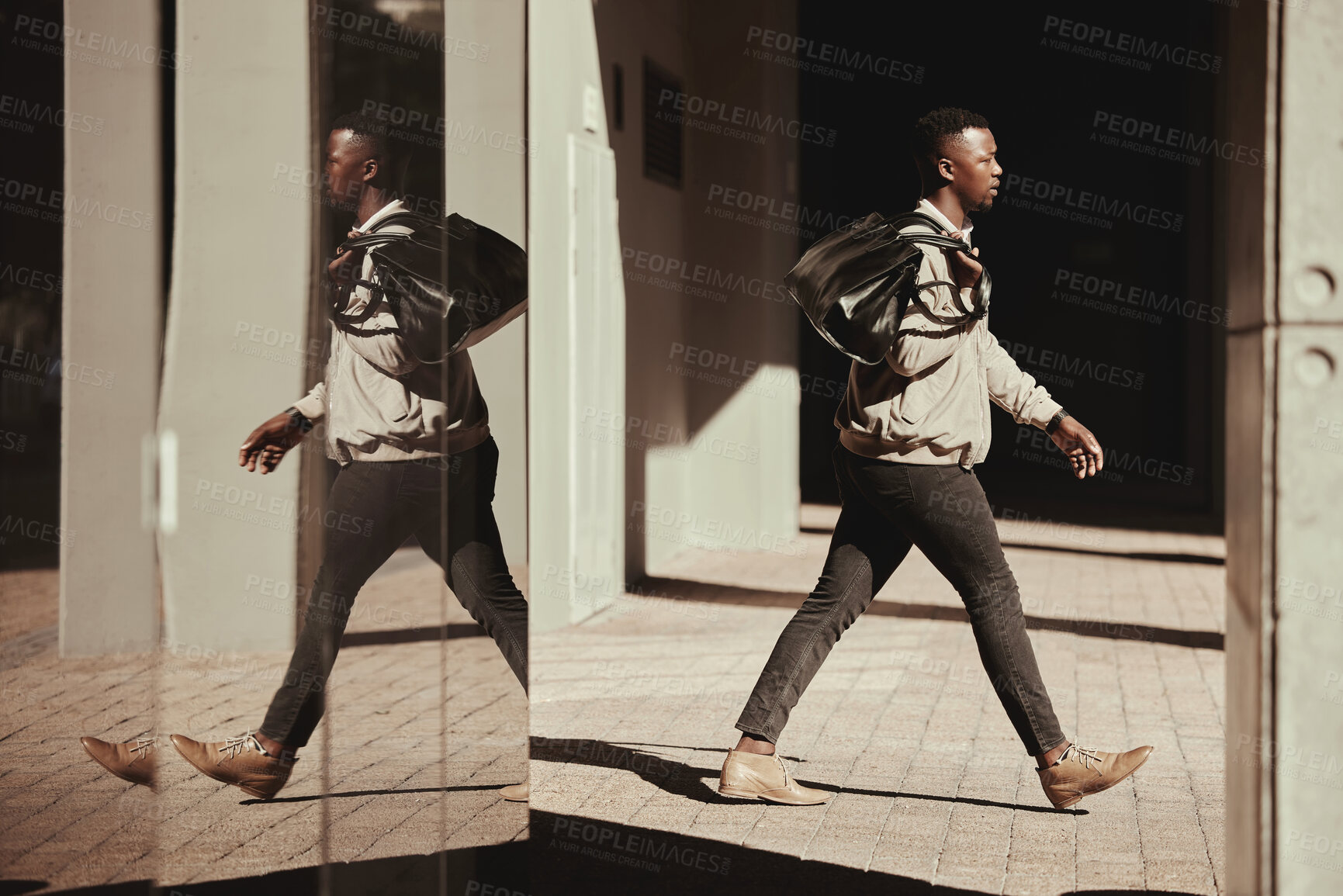 Buy stock photo Stylish, travel and a trendy young man walking out of a building or airport in a city. African American man or traveler traveling in an urban town with good style and fashion going to a hotel