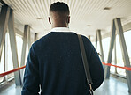 Travel for business at airport, corporate worker walking to plane with luggage. Ceo work trips journey, boarding terminal and back portrait of stylish african business man leaving city