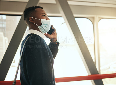 Buy stock photo Phone, train and corporate businessman in covid pandemic mask and suit on call while traveling to work alone. Professional African male startup entrepreneur walking on his daily morning city commute