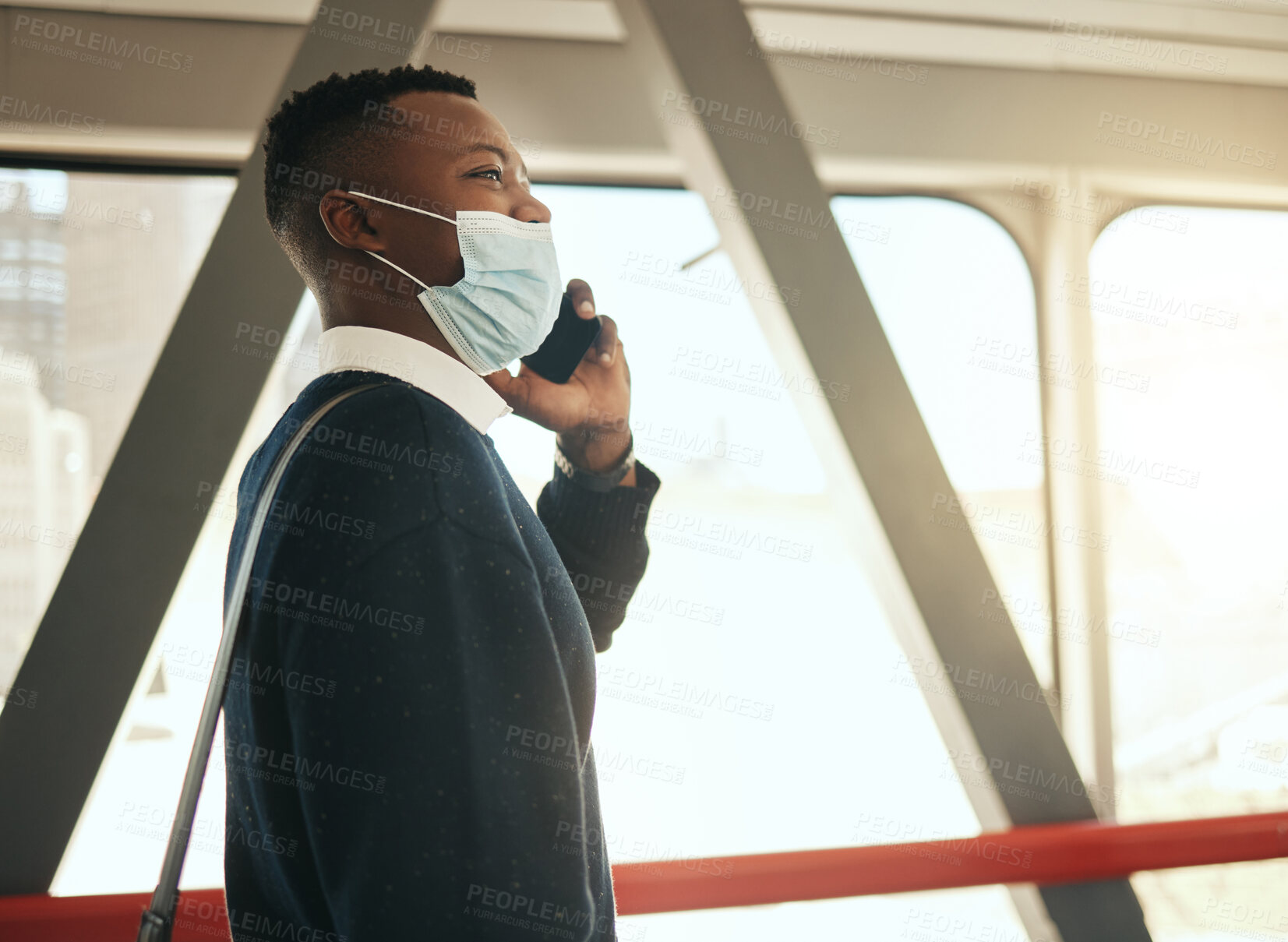 Buy stock photo Phone, train and corporate businessman in covid pandemic mask and suit on call while traveling to work alone. Professional African male startup entrepreneur walking on his daily morning city commute