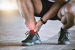 Sports, injury and fitness ankle pain during exercise, running and training outside with red color on foot, muscle or joint. Man, risk and hurt hands athlete holding broken leg bone with bad bruise