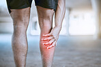 Sports man hand on a leg injury while training, exercise or workout. Red graphic to identify muscle ache or pain in the body after running accident outdoor. Athlete hurt after cardio fitness routine