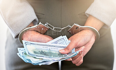 Buy stock photo Handcuffs, dollars and a business woman arrested for theft at work. Money, crime and punishment for fraud with female lawyer in prison. Cash, restraints and a criminal trying to bribe an officer.