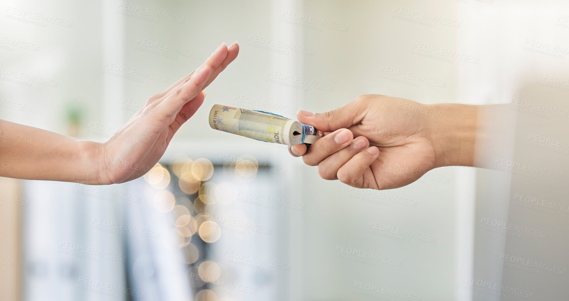 Buy stock photo Person refusing to accept a cash bribe payment from a corrupt financial business partner. Closeup of hands offended by illegal money being offered for a corporate deal by a company manager at work.