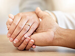 Couple engagement with hands holding and presenting a diamond ring for a save the date announcement. Love, hope and trust between a man and woman with jewelry ready for a future wedding celebration