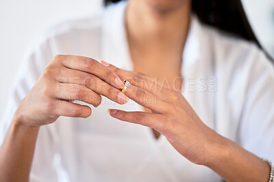 Buy stock photo Woman hand taking off ring or jewelry for divorce and break engagement after fail marriage. Depressed, frustrated or widow sad with regret, upset or worried over cheating or affair in relationship