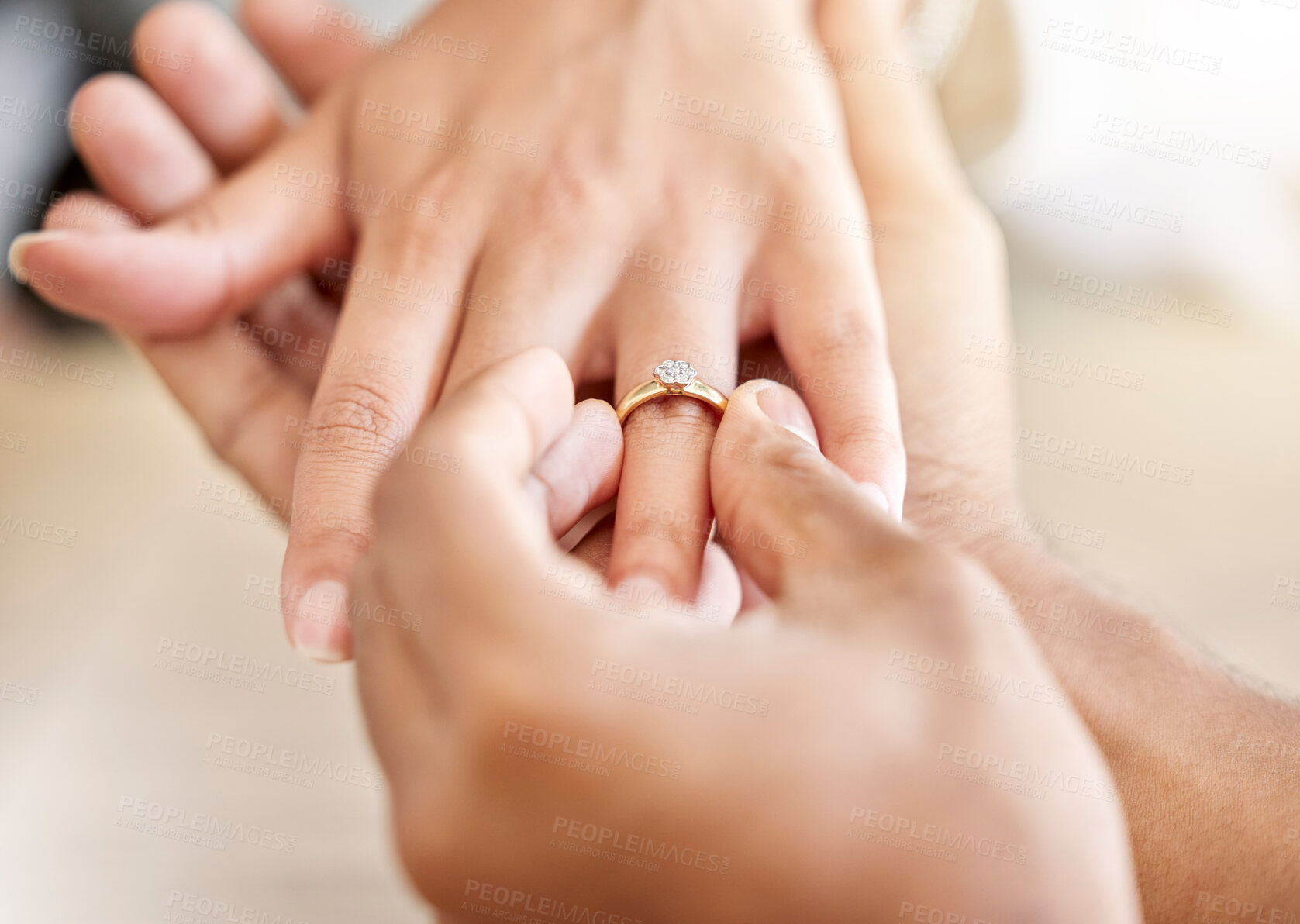 Buy stock photo Closeup hand of proposal engagement ring after romantic, caring and loving man proposes to woman. Bonding, happy and in love couple getting engaged with diamond wedding band on valentines day or date