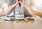 Savings, investment and insurance cover business woman with coins, money and cash in a jar for future plan or personal growth development or housing. Closeup hands covering bank or mortgage expenses