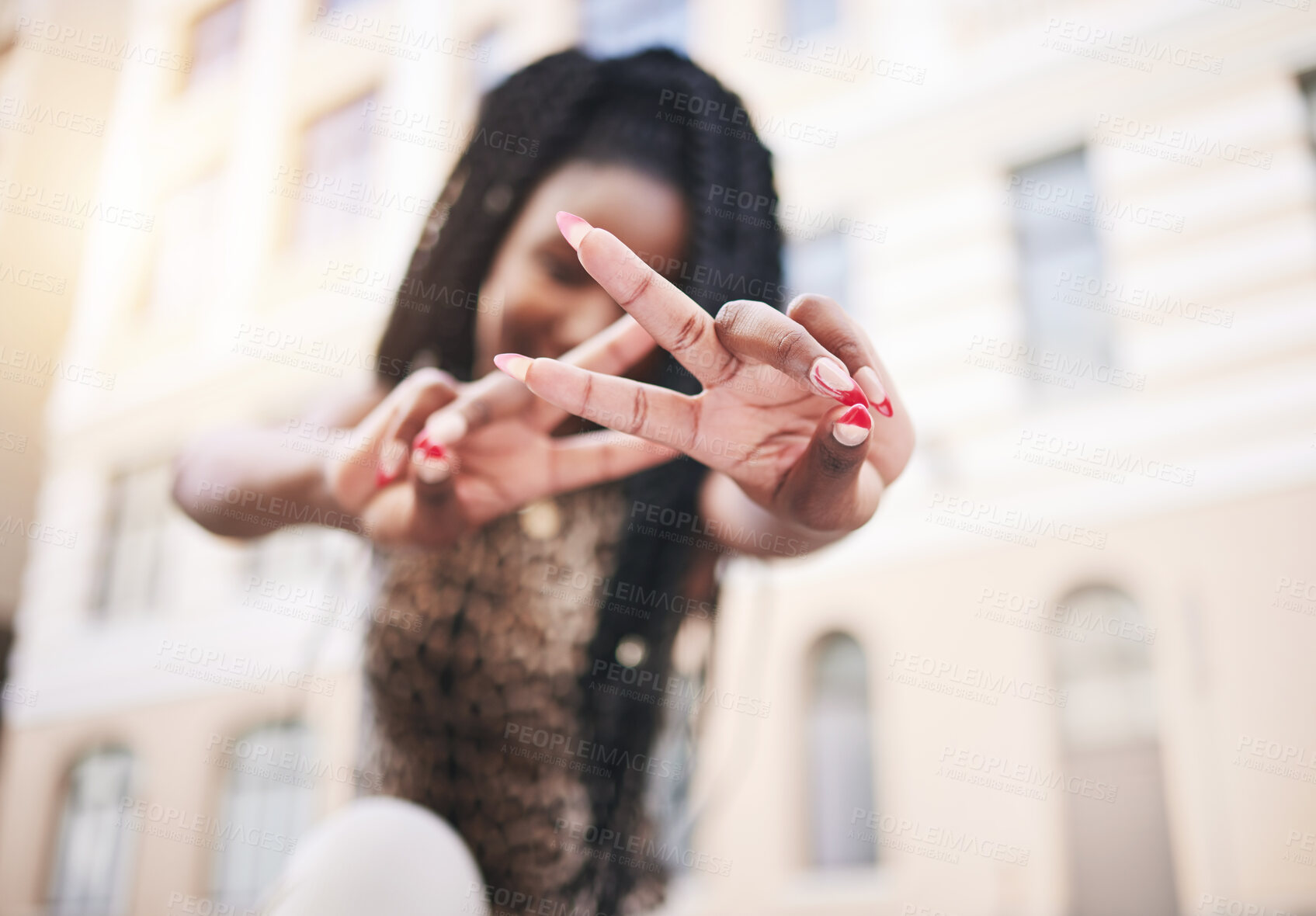 Buy stock photo Hands, peace sign and city woman on street with blurred building background, smile and urban fashion. Peace, empowerment and young black woman at outdoor buildings with happy cool style and in Africa