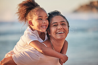 Buy stock photo Family, children and beach with a girl and grandmother outdoor by the sea or ocean during summer. Happy, smile and face with a woman and granddaughter spending time outside together in nature