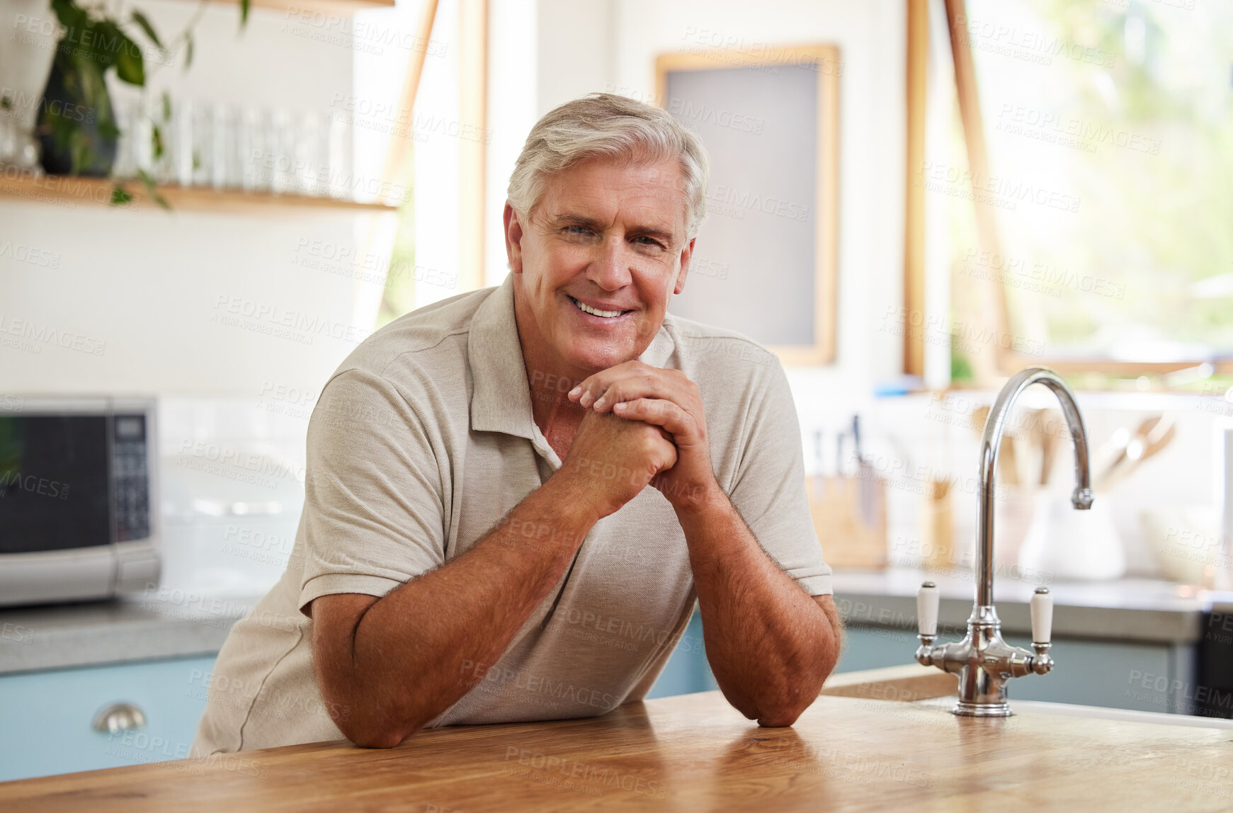 Buy stock photo Smile, portrait and senior man in kitchen home alone in retirement. Relax, retired and elderly happy male from Canada in house, thinking and happiness with lifestyle, confidence and positive mindset.