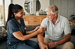 Health, nurse and elderly man help, consulting and talk in his living room at home. Healthcare, mature male and patient with doctor or medical professional in his lounge on  sofa doing healthy test.