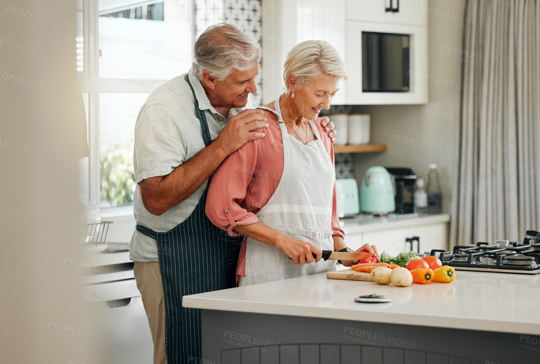 Buy stock photo Senior couple, bonding and cooking in kitchen in a house or home for marriage anniversary or celebration lunch. Smile, happy and love retirement elderly man and woman with nutrition health food