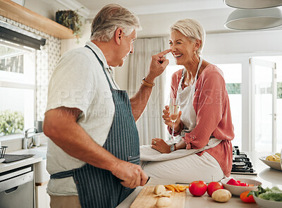 Buy stock photo Champagne, cooking and senior couple in kitchen celebrate retirement with healthy food, vegetables or salad for vegan lifestyle. Celebrate, luxury and elderly woman celebrate with alcohol wine glass