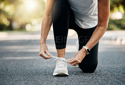 Buy stock photo Fitness, running and shoes of woman in road for morning workout for health, wellness and workout. Sports, exercise and energy with sneakers of senior runner in neighborhood for marathon training