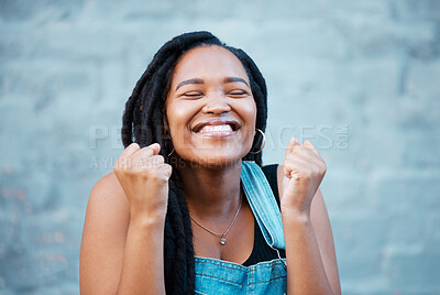 Buy stock photo Black woman, happy and excited smile of a winner from Jamaica feeling happiness. Smiling face of a person with excitement, positive energy and gratitude mindset with a gray brick background