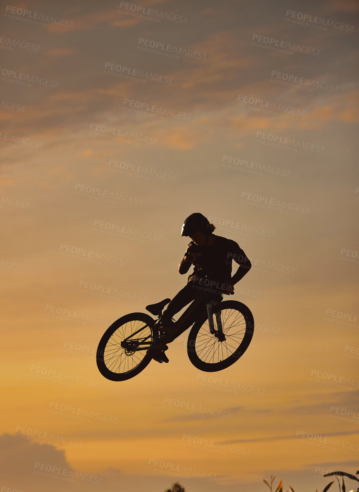 Buy stock photo Mountain bike, cyclist and fitness jump at sunset in Colorado countryside nature in workout, exercise or training. Danger risk, extreme bmx sports or freedom cycling man in sunrise with stunt energy