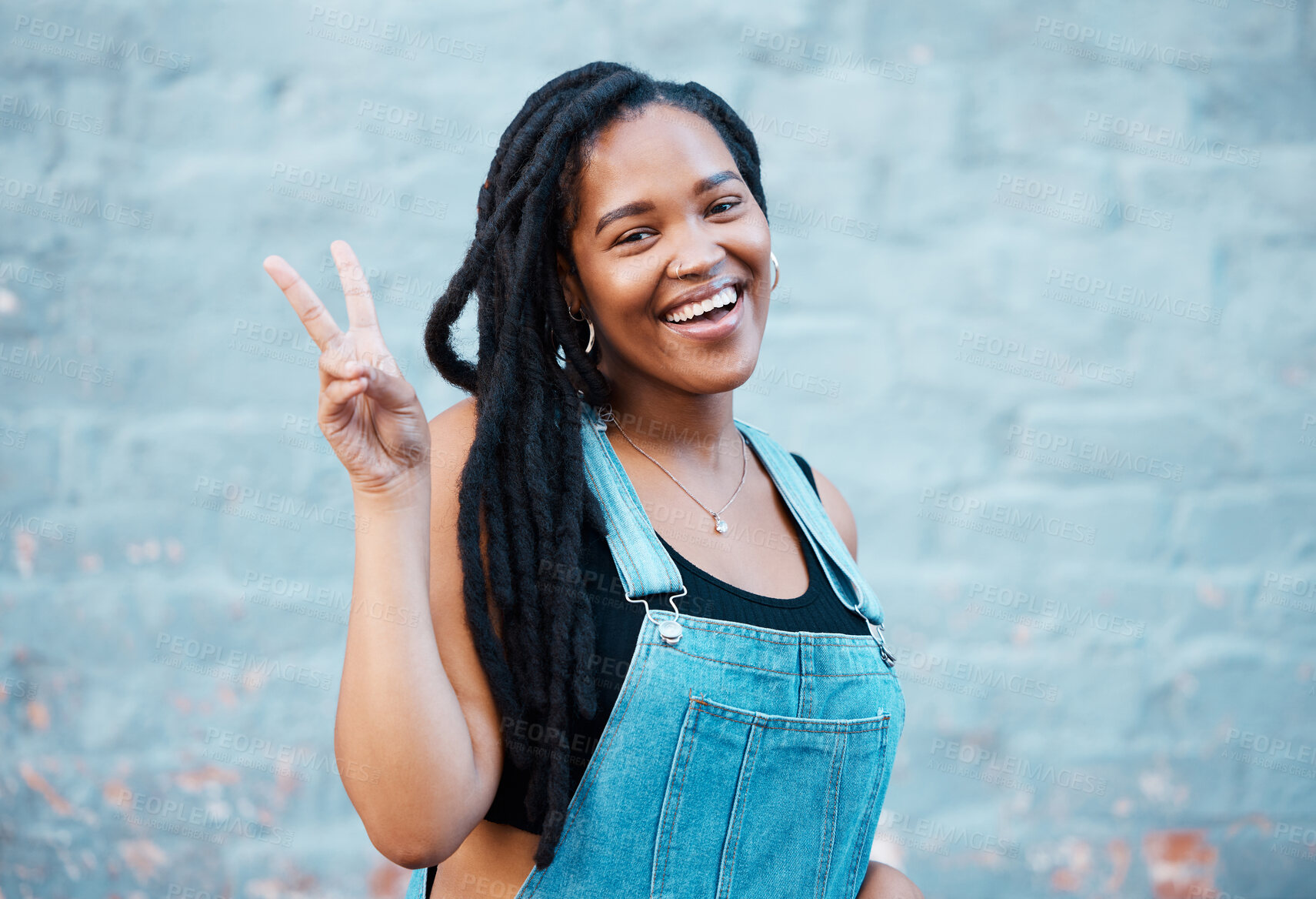 Buy stock photo Black woman, peace sign or fashion on city building wall, mockup space or mock up in style, trend or cool clothes in Atlanta. Portrait, happy smile or student model with fun, cool or playful gesture