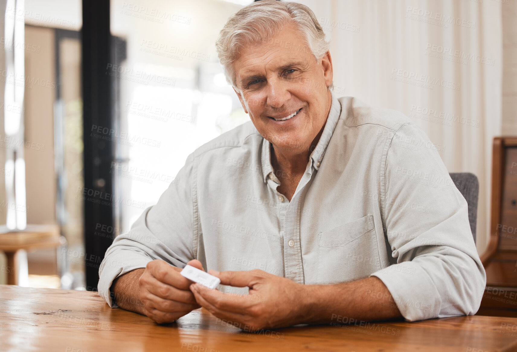 Buy stock photo Senior man, home and covid antigen test medical healthcare results check for corona virus on PCR and ATK exam. Retirement, elderly and retired Canada person at table rapid test for covid 19 at house