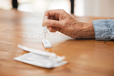 Buy stock photo Hands, antigen test or rapid test dropper in home, house or living room table for covid, healthcare insurance or medical virus. Zoom, senior man or pcr covid 19 check for lockdown compliance patient