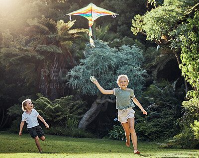 Buy stock photo Nature, running and children flying a kite game enjoying summer together as girl siblings on a weekend in summer. Smile, happy and excited kids playing and having fun with freedom outdoors on holiday