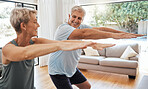 Health, retirement and couple squat at house in Canada  for senior body wellness training. Happy elderly people in marriage enjoy vitality workout to bond together in home living room.


