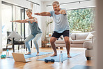 Yoga, online class and senior couple in living room, Workout, zen and fitness in retirement for man and woman with laptop. Stretching, balance and old people exercise at home streaming pilates video.