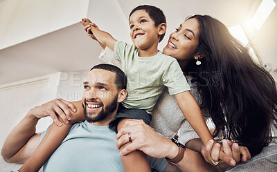 Buy stock photo Mother, father and child are playing as a happy family having fun, bonding and enjoying quality time together at home. Smile, mom and dad smiling with playful young boy on the weekend in Mexico