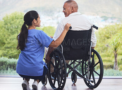 Buy stock photo Healthcare, disability and man in wheelchair with nurse on retirement or nursing home patio. Senior care, happy disabled grandpa and woman caregiver with smile enjoying the view at hospital or clinic