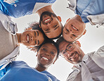 Team, diversity and doctors in circle from below, teamwork, support and help from hospital staff. Group of medical workers in huddle looking down head together. Teammates, men and women in healthcare
