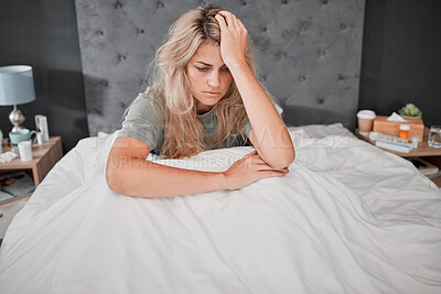 Buy stock photo Stress, anxiety and depression, a woman in bed, thinking sad and anxious, too sick too get up. Depressed lady in bedroom with medicine, prescription drugs and pills for mental health care in USA.