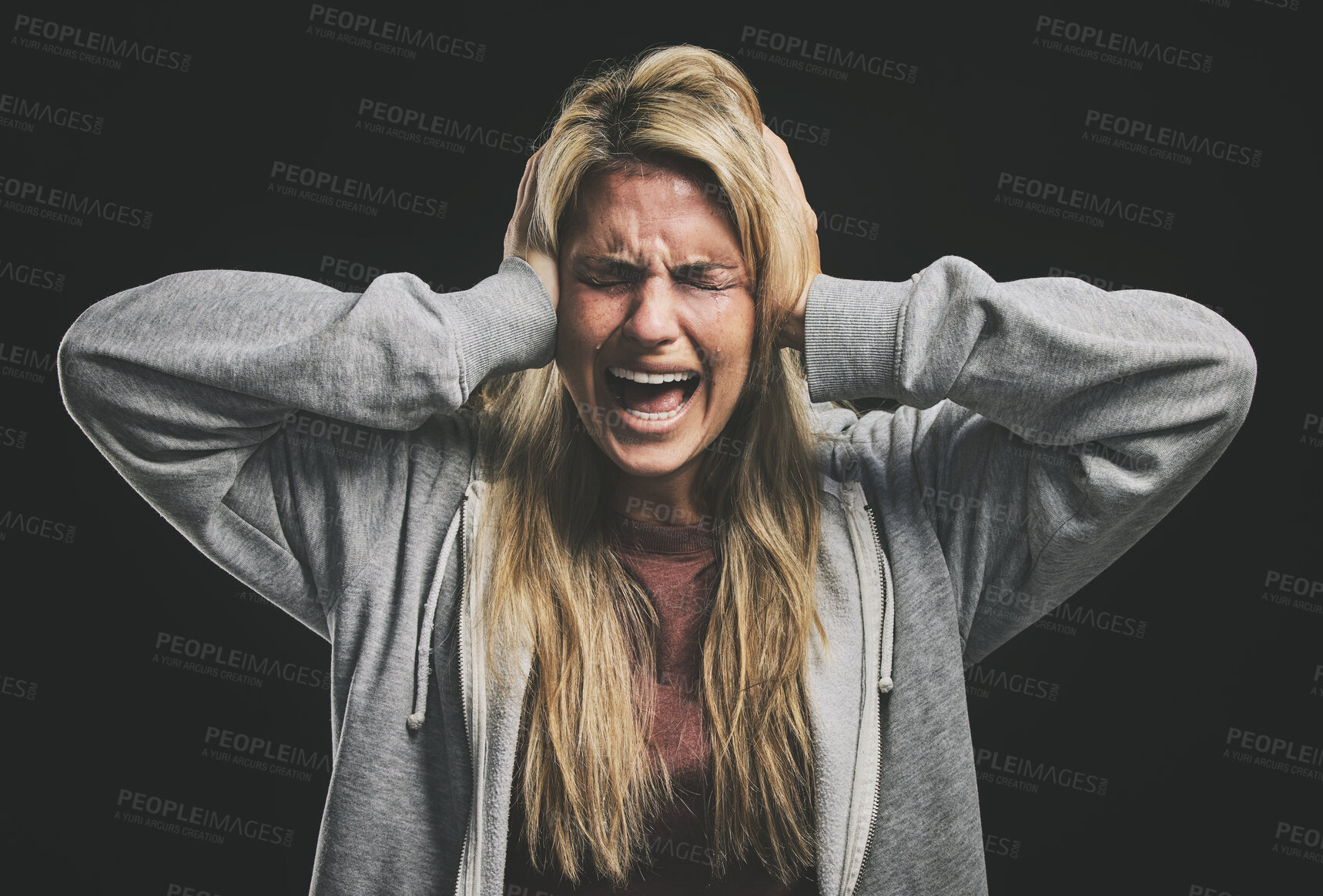 Buy stock photo Anxiety, bipolar woman crying, frustrated or crazy on a dark studio for psychology and mental health mock up. Trauma, schizophrenia or depressed girl shout with depression, fear and mental illness