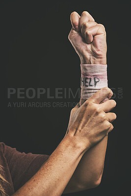 Buy stock photo Help, suicide and injury for hand of man with depression, mental health problem or anxiety. Dark fear, self harm fail and sad mentally ill person with pain, wrist bandage and depressed over life
