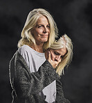 Depression, bipolar mask and woman with mental health problem against a black mockup studio background. Face portrait of a mature person with facade with fear, angry and depressed about anxiety